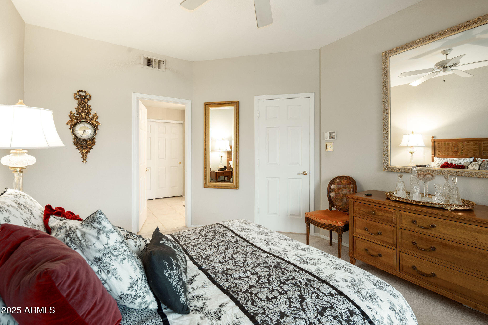 10410 North Cave Creek Road, Unit 2035 Phoenix, AZ 85020 - Photo 12 of 20 a bedroom with a bed and dresser