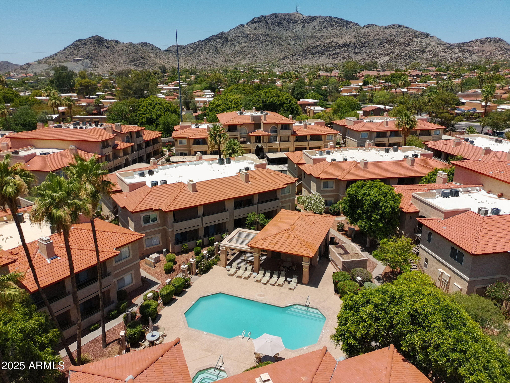 10410 North Cave Creek Road, Unit 2035 Phoenix, AZ 85020 - Photo 17 of 20 an aerial view of residential houses and outdoor space