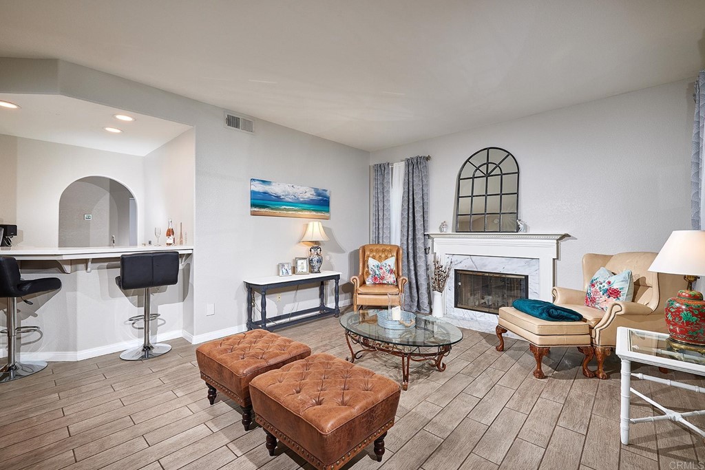 3518 Sarah Ann Drive Fallbrook, CA 92028 - Photo 13 of 49 a living room with furniture and a fireplace