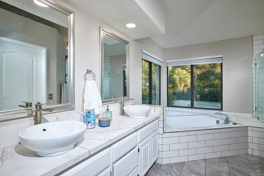 3518 Sarah Ann Drive Fallbrook, CA 92028 - Photo 24 of 49 a bathroom with a tub sink and mirror