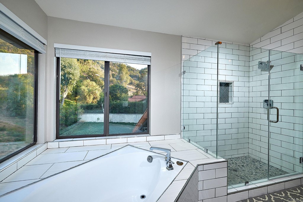 3518 Sarah Ann Drive Fallbrook, CA 92028 - Photo 25 of 49 a bathroom with a sink and a large window
