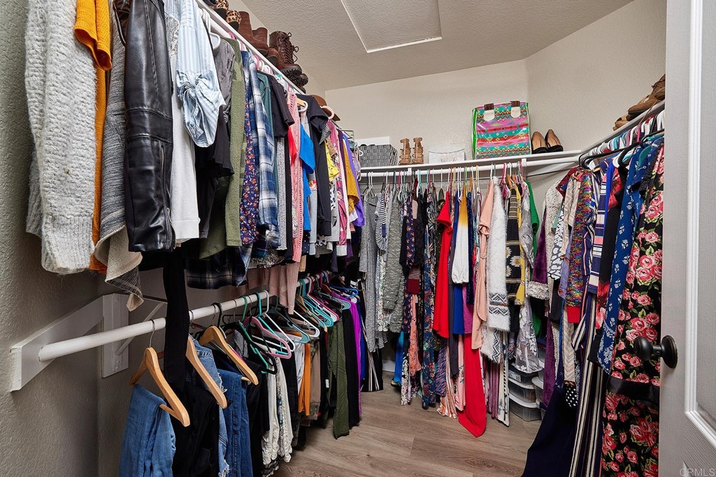 3518 Sarah Ann Drive Fallbrook, CA 92028 - Photo 26 of 49 a view of walk in closet with clothes