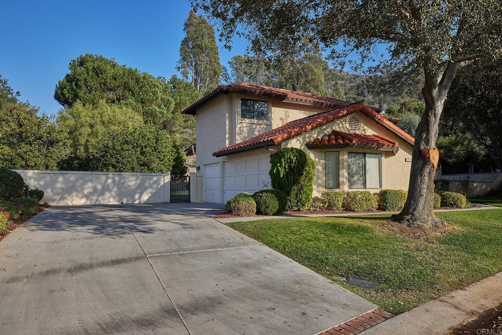 3518 Sarah Ann Drive Fallbrook, CA 92028 - Photo 36 of 49 a front view of a house with a yard