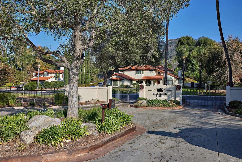 3518 Sarah Ann Drive Fallbrook, CA 92028 - Photo 48 of 49 a front view of a house with garden