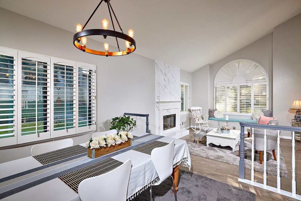 3518 Sarah Ann Drive Fallbrook, CA 92028 - Photo 5 of 49 a spacious bedroom with furniture a chandelier and a large window