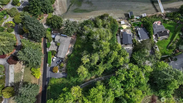an outdoor view of house with green space