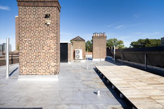 a view of a balcony with city view