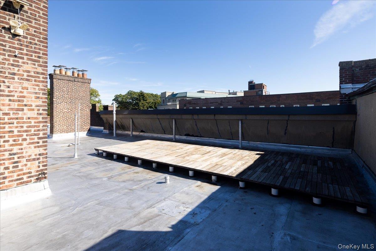 83-09 Talbot, Unit 6L Queens, NY 11415 - Photo 13 of 19 a view of a balcony with two chairs