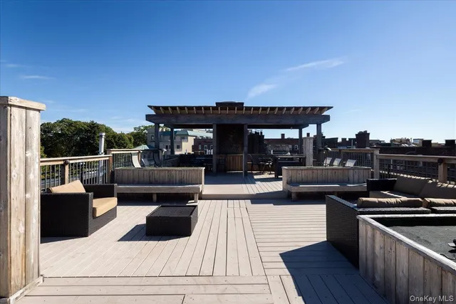 a view of a terrace with furniture