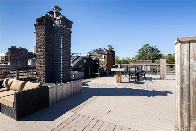 a view of a terrace with chairs