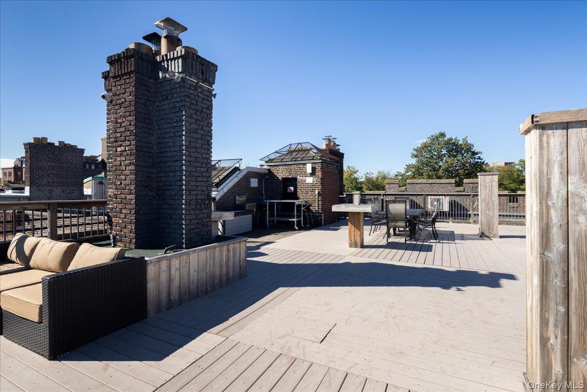 83-09 Talbot, Unit 6L Queens, NY 11415 - Photo 16 of 19 a view of a terrace with chairs