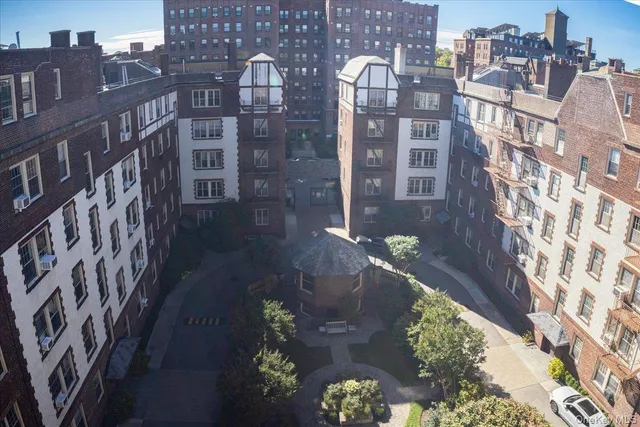 a view of a city with tall buildings