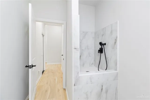 a front view of a house with a big yard