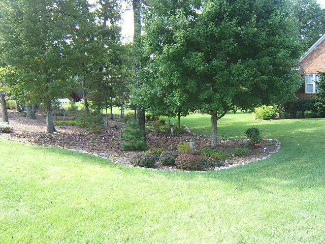 133 Piper Glenn Blue Ridge, VA 24064 - Photo 3 of 73 a view of a garden with a fountain