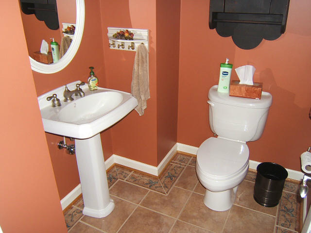 133 Piper Glenn Blue Ridge, VA 24064 - Photo 9 of 73 a bathroom with a toilet a sink and a mirror