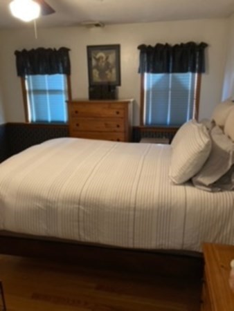 7 Willow Street Holyoke, MA 01040 - Photo 12 of 33 a bedroom with a bed and a mirror