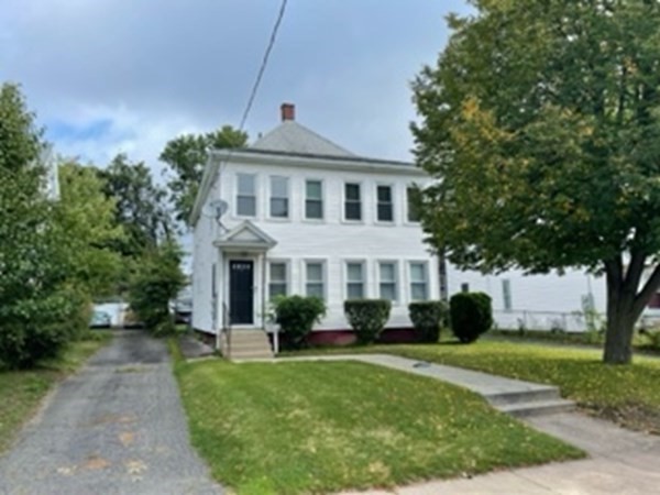 7 Willow Street Holyoke, MA 01040 - Photo 4 of 33 a front view of a house with garden