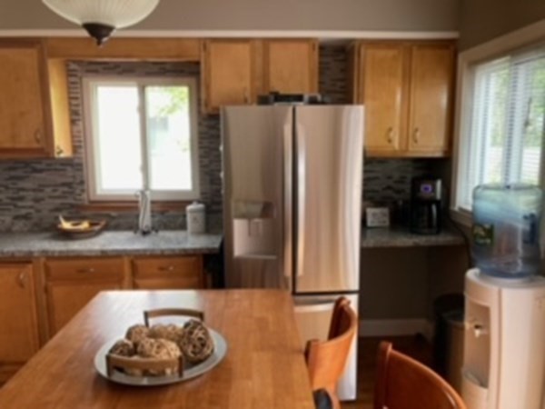 7 Willow Street Holyoke, MA 01040 - Photo 7 of 33 a kitchen with a refrigerator and a sink