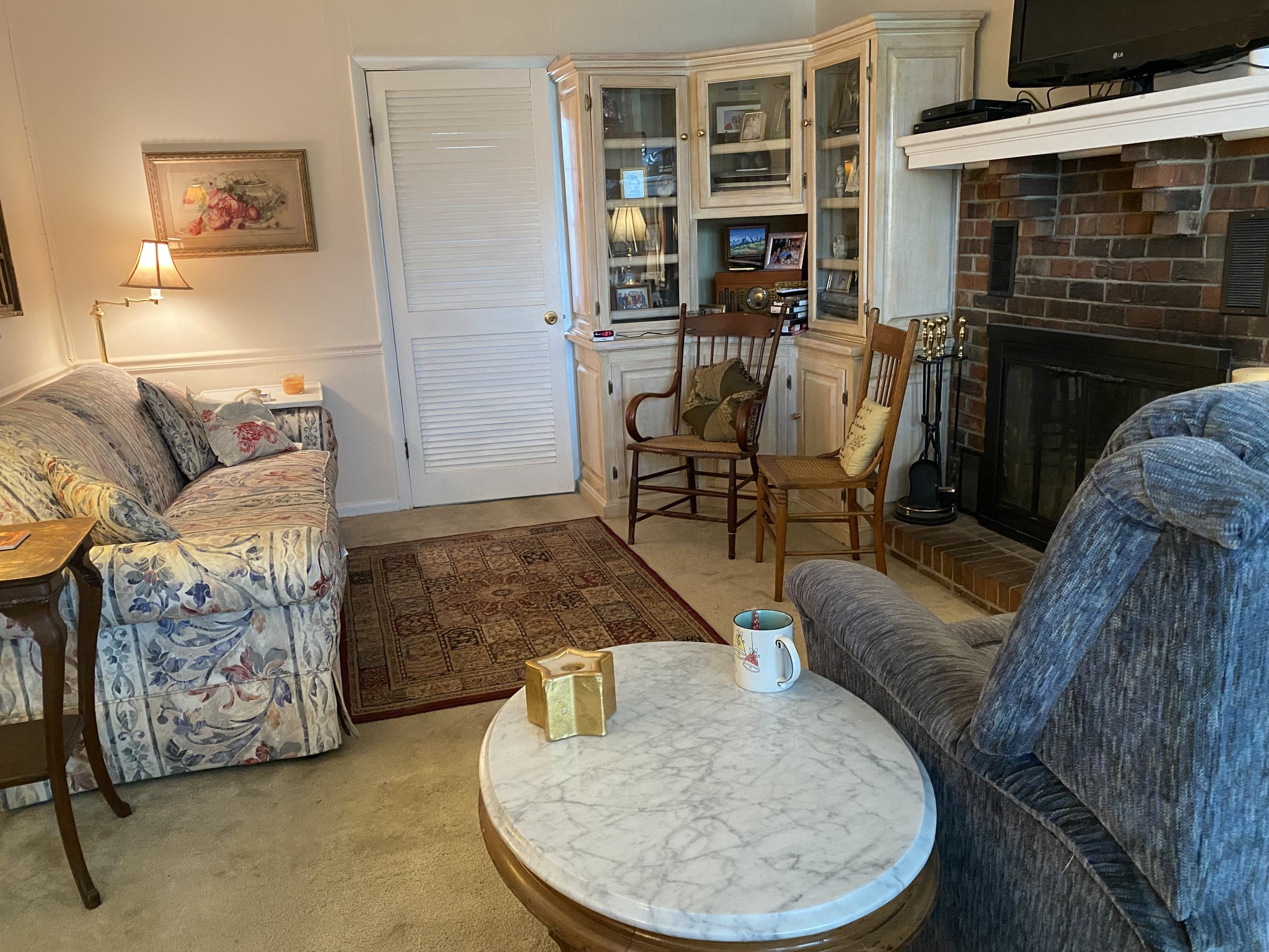 4269 Pate Road Franklin, TN 37064 - Photo 6 of 10 a living room with furniture and a fireplace