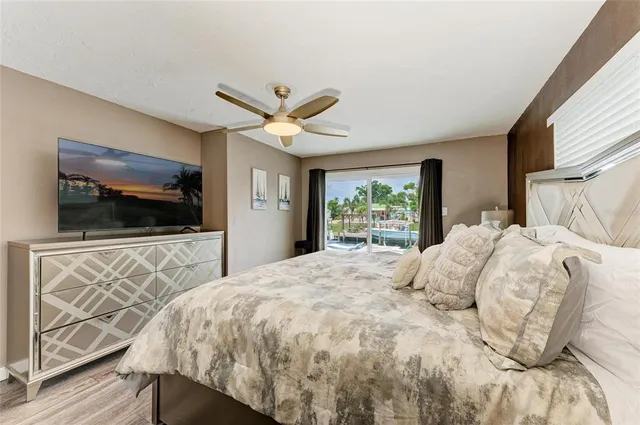 a bedroom with furniture and a bed