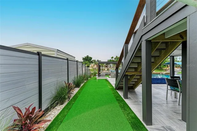 a view of a brick building with a yard