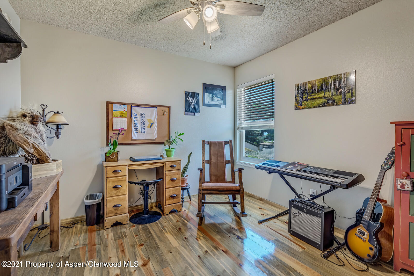511 Fairway Avenue Rifle, CO 81650 - Photo 14 of 17 a view of a livingroom with furniture and a workspace