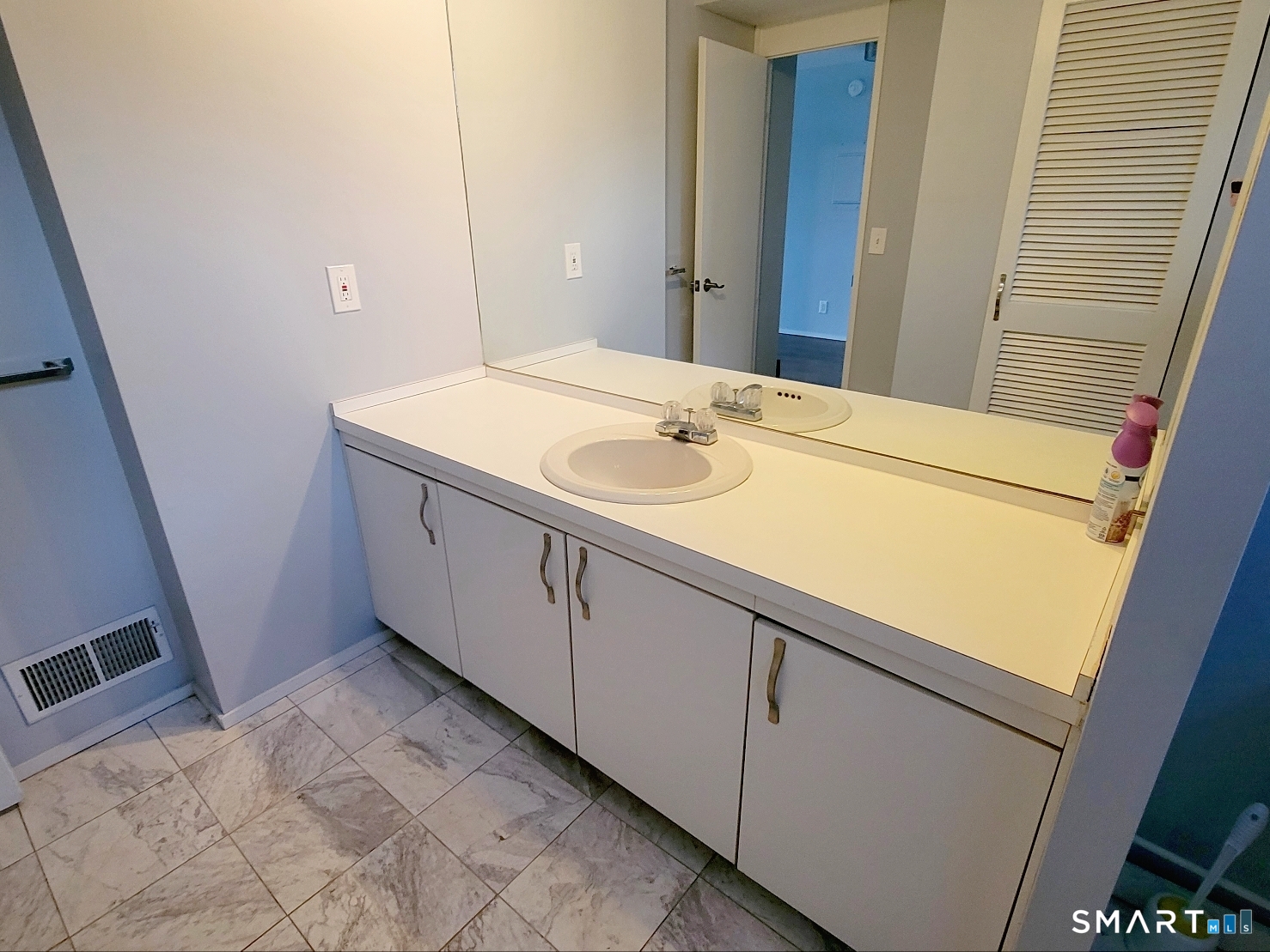 2 Front Street, Unit 2J New Haven, CT 06513 - Photo 12 of 15 a bathroom with a sink and a mirror