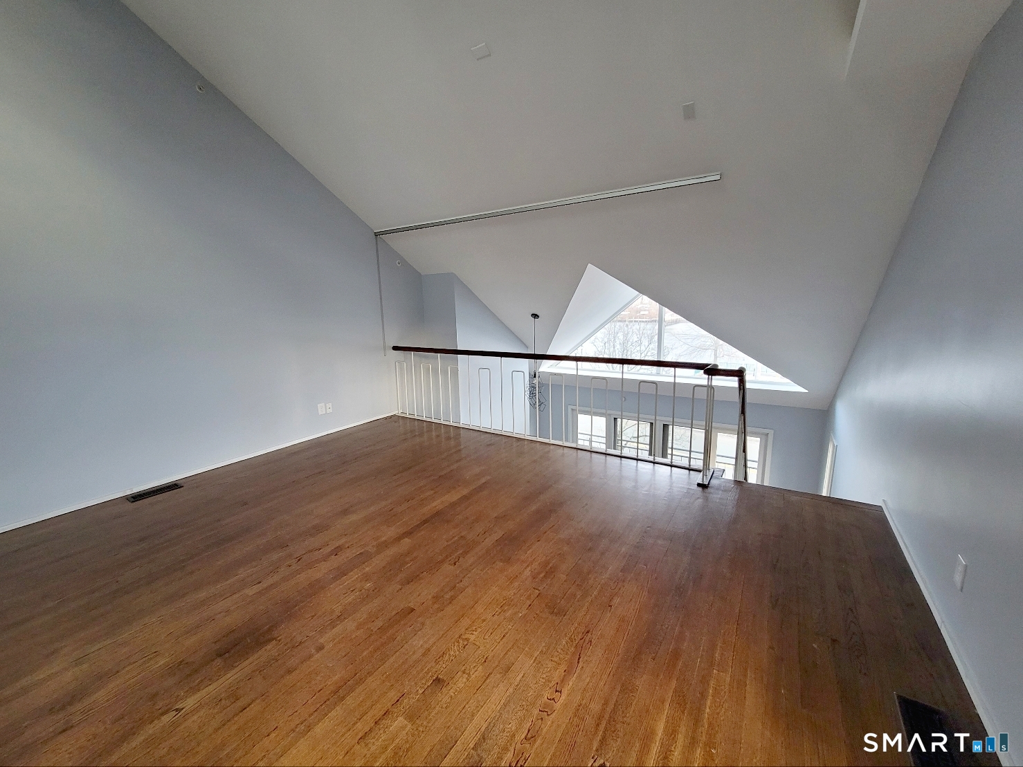 2 Front Street, Unit 2J New Haven, CT 06513 - Photo 6 of 15 a view of empty room with wooden floor