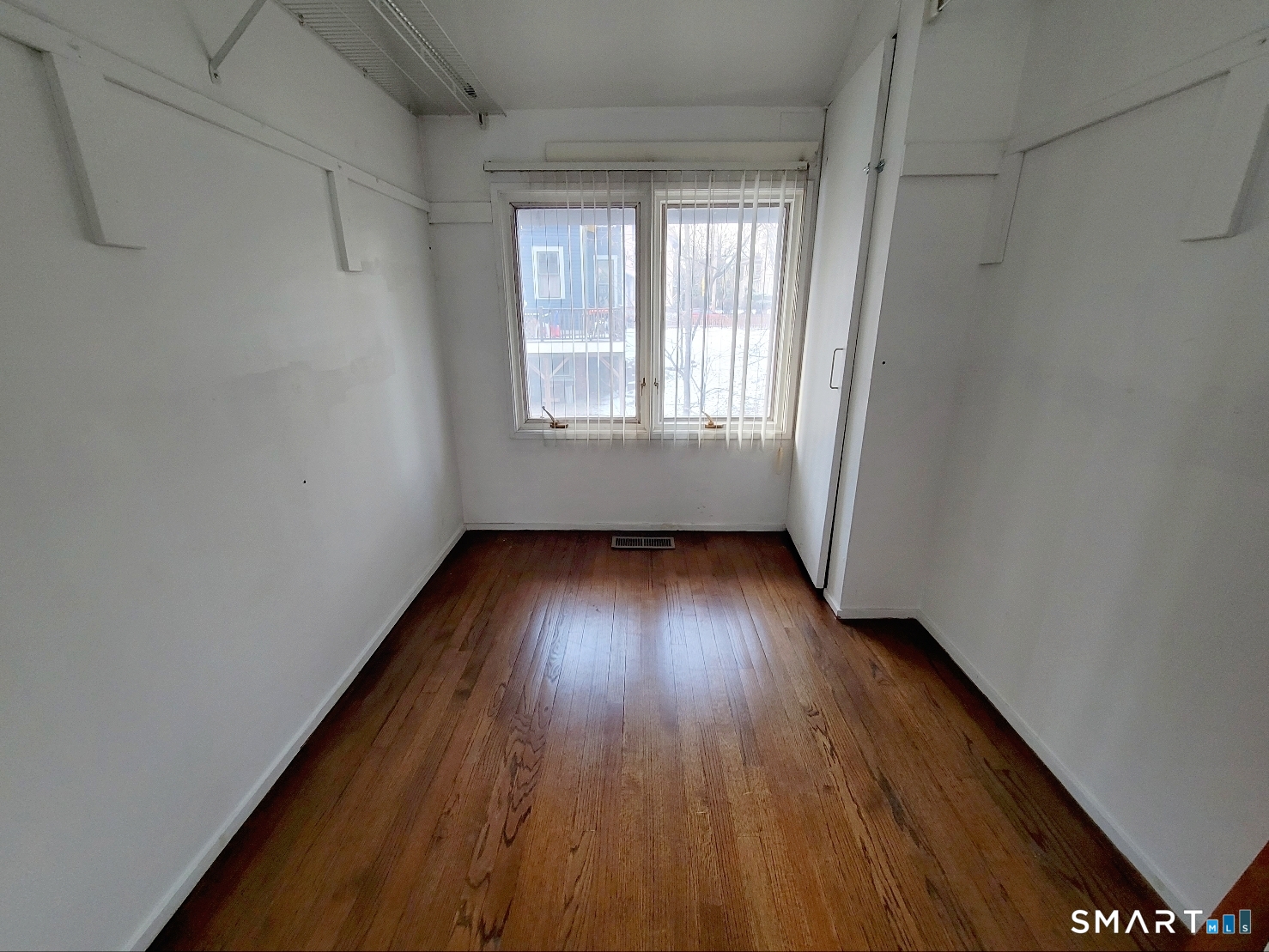 2 Front Street, Unit 2J New Haven, CT 06513 - Photo 9 of 15 a view of a room with wooden floor and window