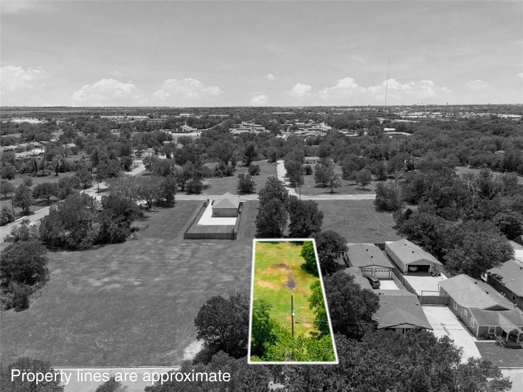 2825 South 7th Street Waco, TX 76706 - Photo 3 of 11 an aerial view of a house with a swimming pool