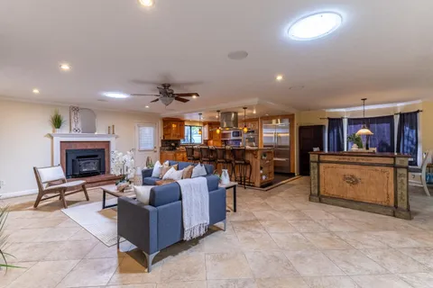a view of a bathroom with a tub and shower