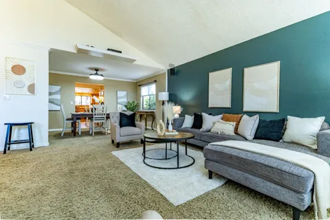 a view of a dining room with furniture