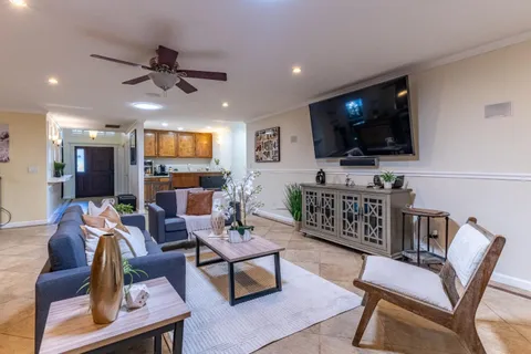 a view of outdoor sitting space with furniture