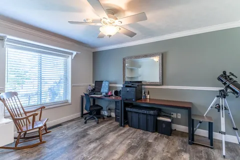 an outdoor view of a house with a street