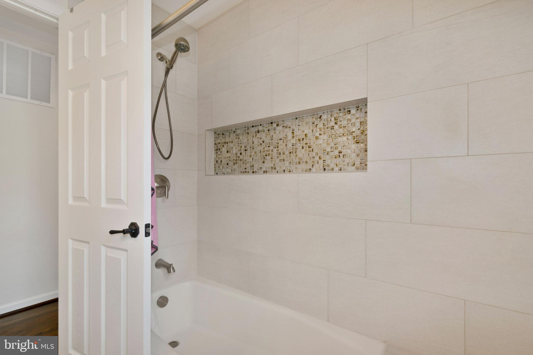 11600 Coldstream Drive Potomac, MD 20854 - Photo 17 of 25 a bathroom with a shower