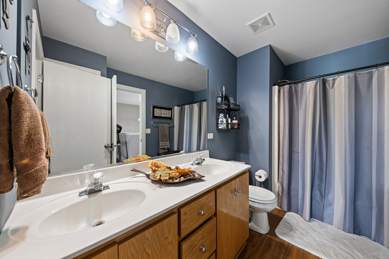 8331 Chestnut Court Frankfort, IL 60423 - Photo 8 of 15 a bathroom with a sink vanity granite and toilet
