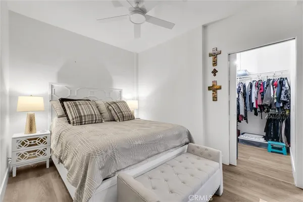 a bedroom with a bed and a view of bedroom