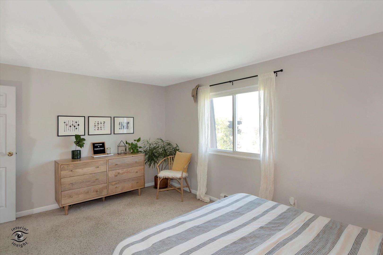 19300 Wolf Road, Unit 10 Mokena, IL 60448 - Photo 14 of 22 a bedroom with a bed and window