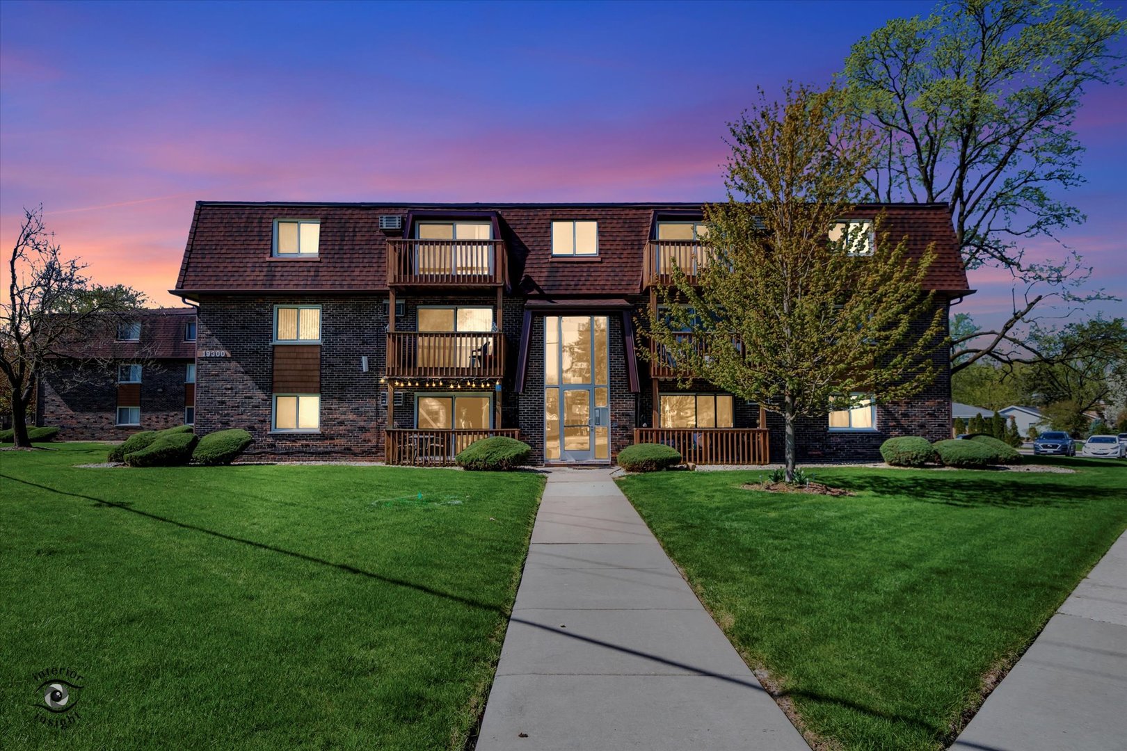 19300 Wolf Road, Unit 10 Mokena, IL 60448 - Photo 2 of 22 a front view of a house with garden