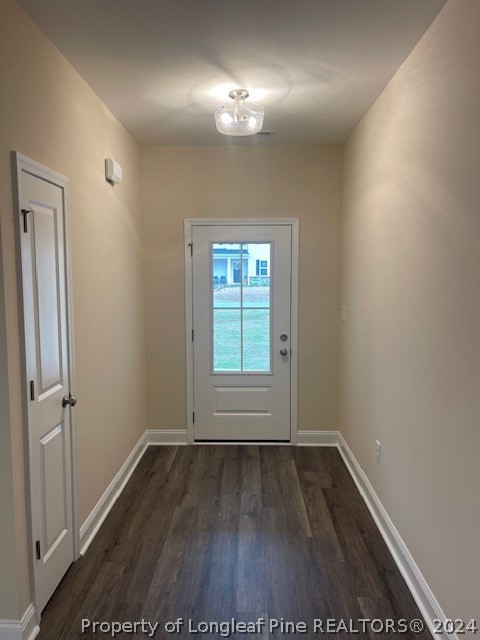 179 Rocking Canal Place Erwin, NC 28339 - Photo 2 of 17 an empty room with wooden floor and windows