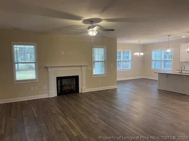 179 Rocking Canal Place Erwin, NC 28339 - Photo 3 of 17 a view of an empty room with a fireplace and a window