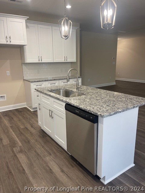 179 Rocking Canal Place Erwin, NC 28339 - Photo 7 of 17 a kitchen with sink cabinets and chandelier