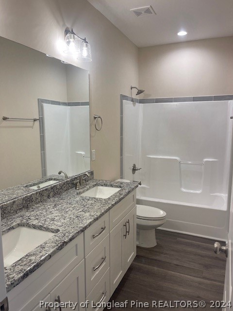 179 Rocking Canal Place Erwin, NC 28339 - Photo 8 of 17 a bathroom with a granite countertop sink toilet and shower