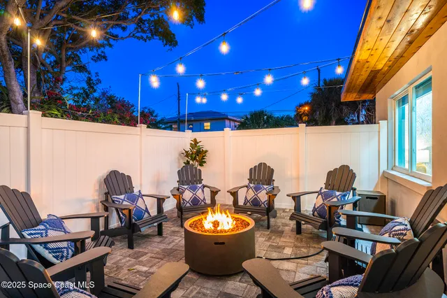 a outdoor living space with furniture and a potted plant