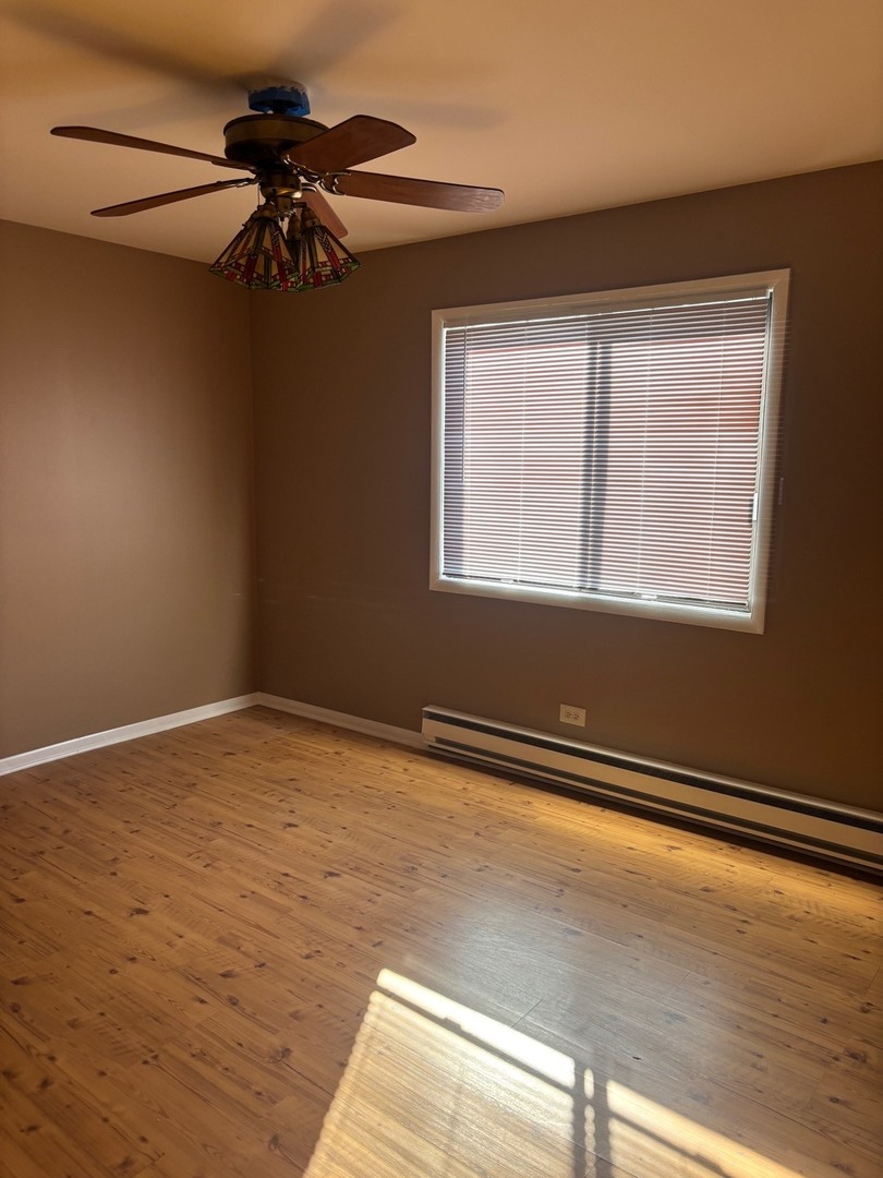 6323 West 64th Place, Unit 1D Chicago, IL 60638 - Photo 7 of 16 a view of an empty room with a window