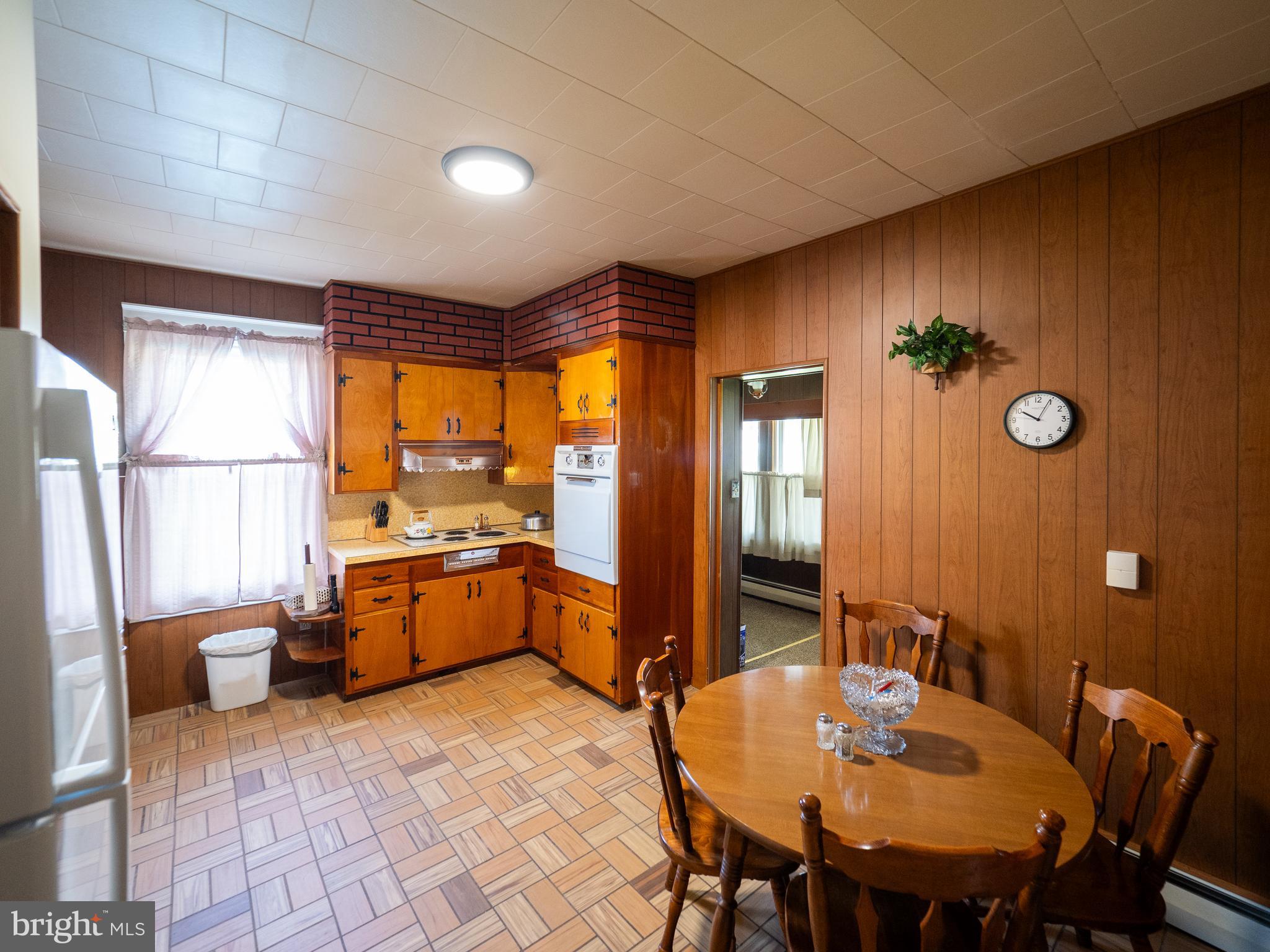 1615 Butler Street Easton, PA 18042 - Photo 18 of 38 a large kitchen with a table and chairs
