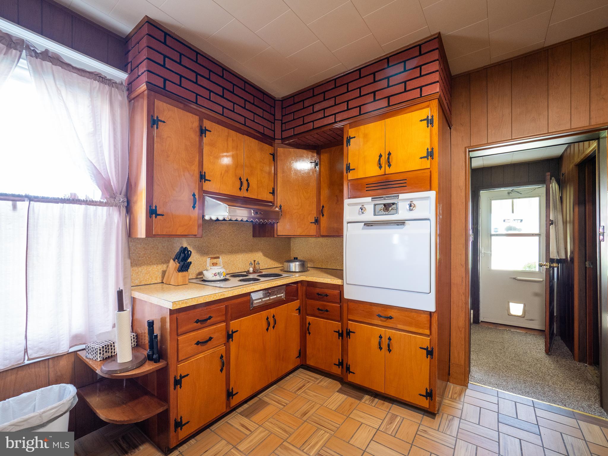 1615 Butler Street Easton, PA 18042 - Photo 20 of 38 a kitchen with a sink appliances cabinets and a window
