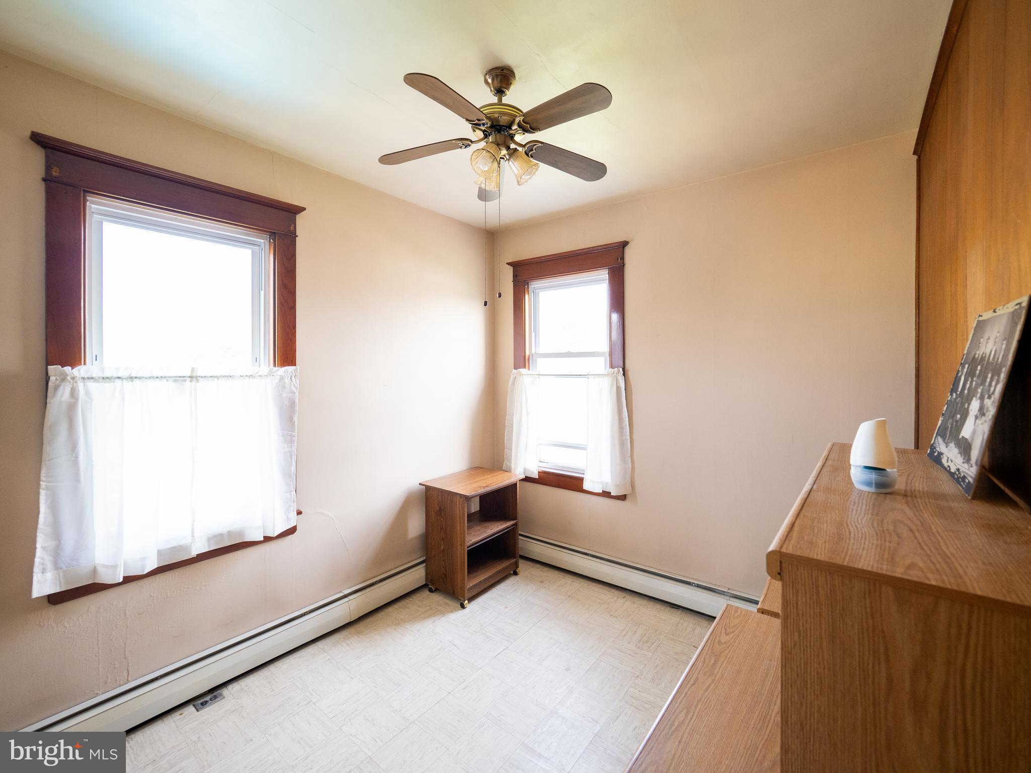 1615 Butler Street Easton, PA 18042 - Photo 25 of 38 a room with window and a ceiling fan