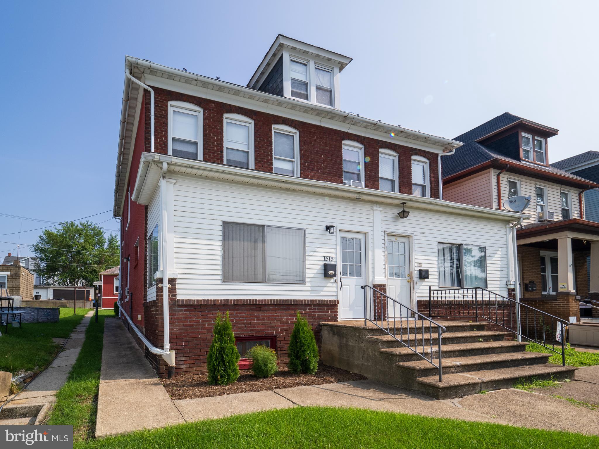 1615 Butler Street Easton, PA 18042 - Photo 3 of 38 a front view of a house with a yard