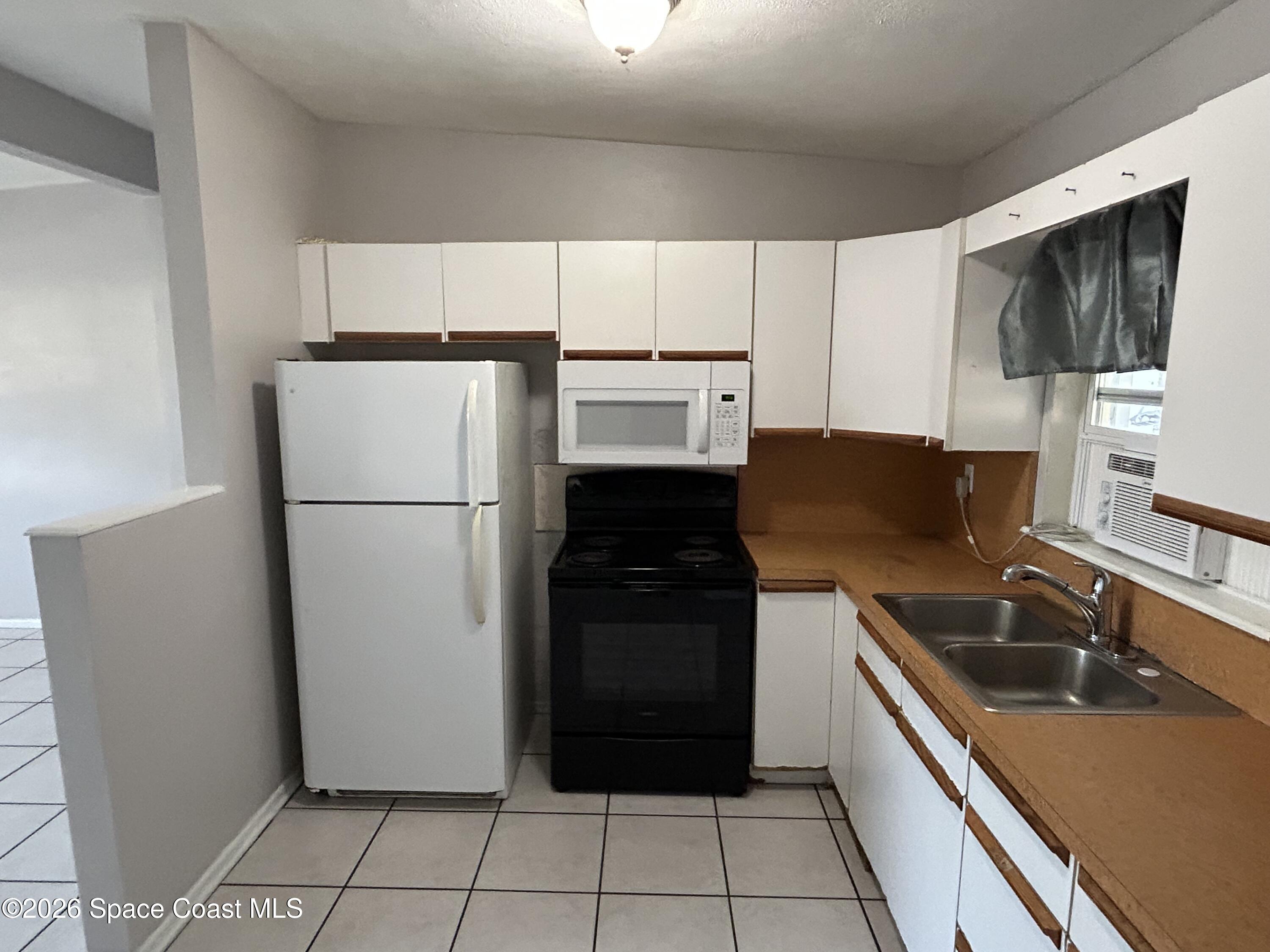 2338 Shenandoah Road, Unit A Palm Bay, FL 32905 - Photo 5 of 11 IMG_7793